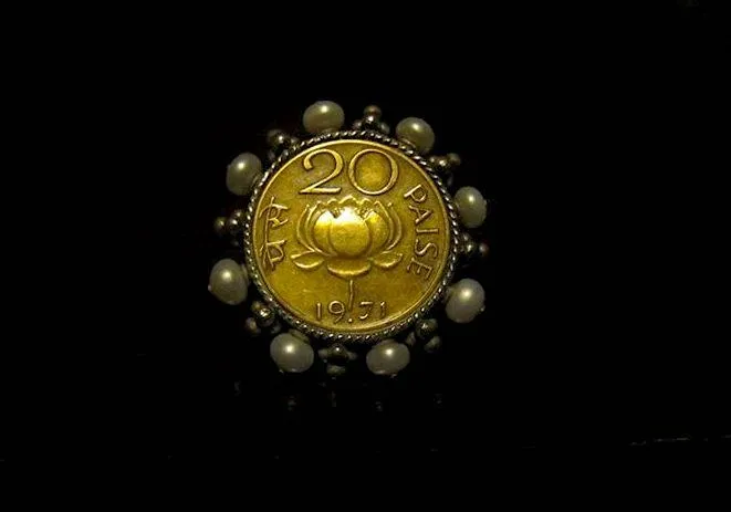 Gorgeous, vintage lotus coin ring with a pearl frame
