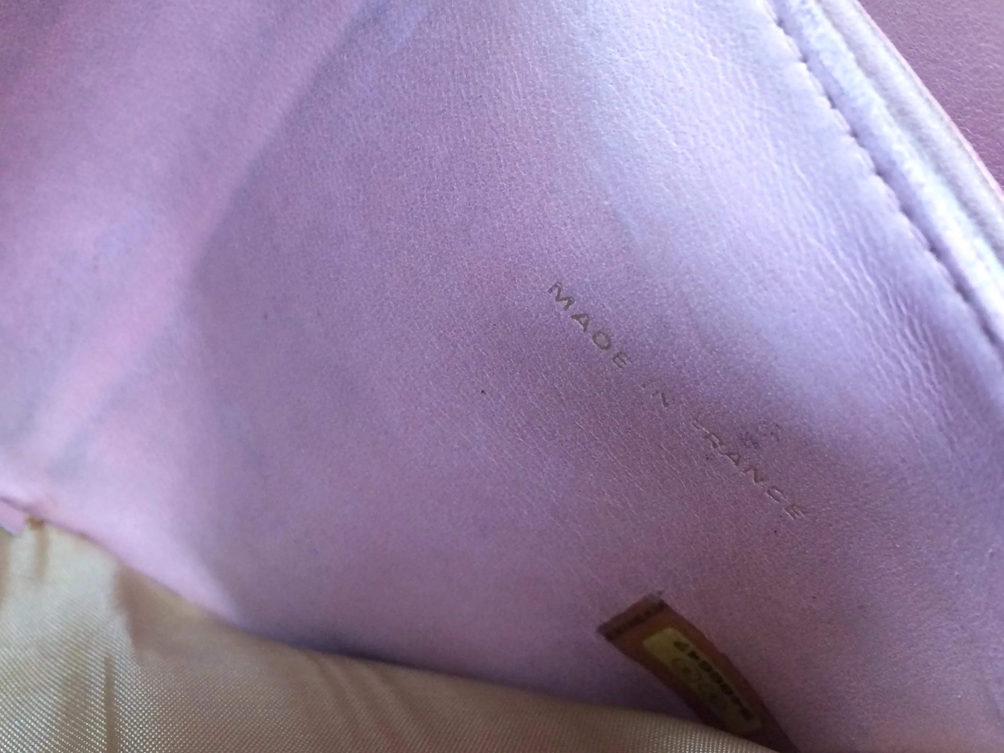 Vintage CHANEL milky pink caviar leather wallet with stitched CC mark. Classic.